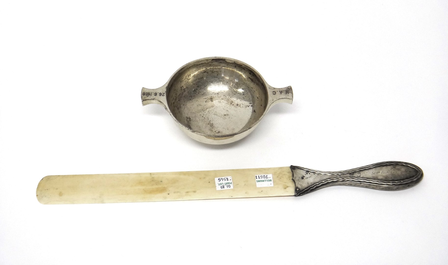 Appraisal: A Scottish silver twin handled quaich of circular form on