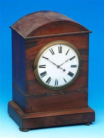 Appraisal: A rosewood timepiece the movement signed W A Dawes Attleborough