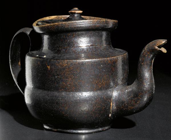 Appraisal: GEORGE OHR Teapot with bulbous base covered in gun-metal brown