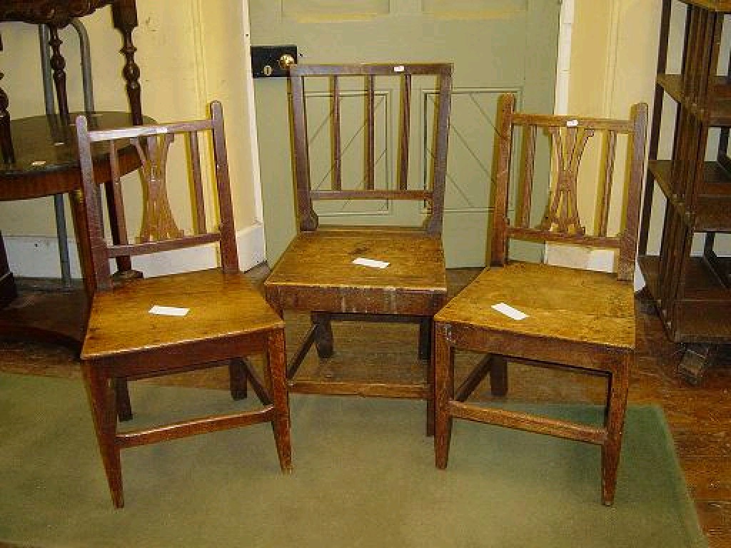 Appraisal: A pair of Georgian oak dining side chairs with pierced