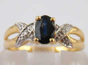 Appraisal: A yellow metal tests carat gold sapphire and diamond ring