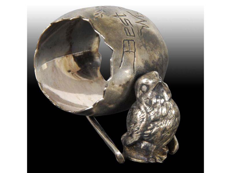 Appraisal: Small Chick On Wishbone Figural Napkin Ring Description Resembles cracked