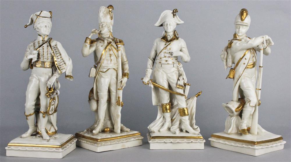 Appraisal: FOUR CONTINENTAL GILT AND WHITE MODELS OF NAPOLEONIC SOLDIERS bearing