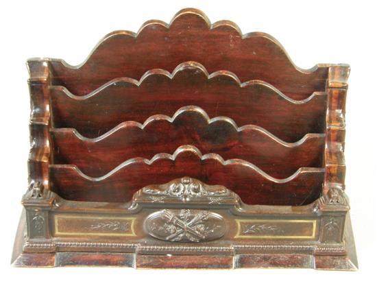 Appraisal: Twentieth century French mahogany stationery rack with shaped partitions and