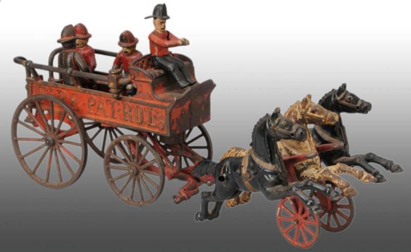 Appraisal: Cast Iron Horse-Drawn Fire Patrol Wagon Toy Description Pulled by