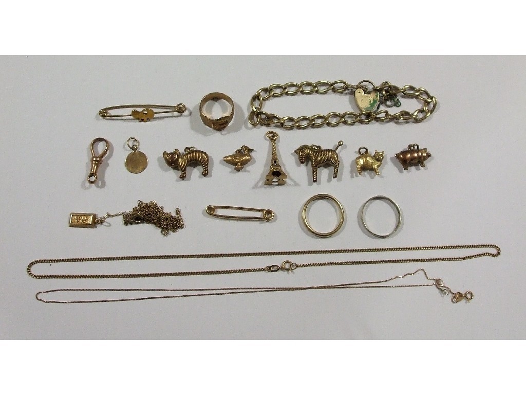 Appraisal: Lot of ct gold to include curb link bracelet charms