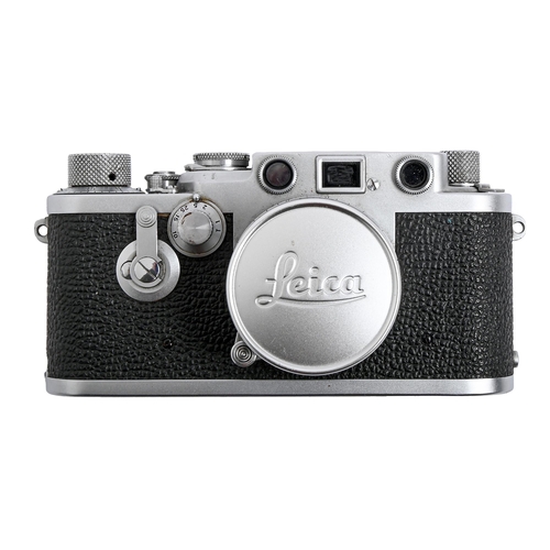 Appraisal: A Leica IIIf chrome rangefinder camera serial number LOOPN red