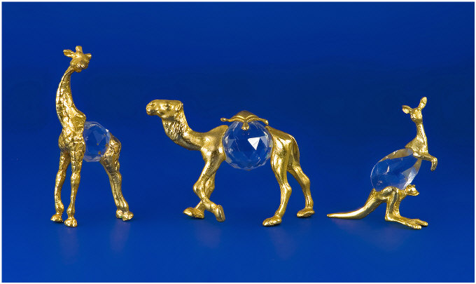 Appraisal: Three Animal Figures In gold coloured metal and crystal Camel