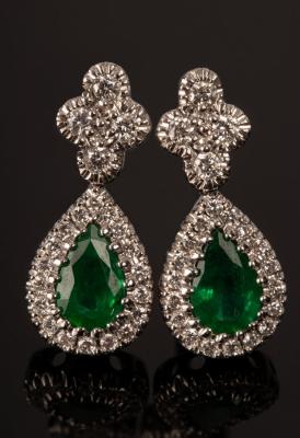 Appraisal: A pair of emerald and diamond cluster earrings set in