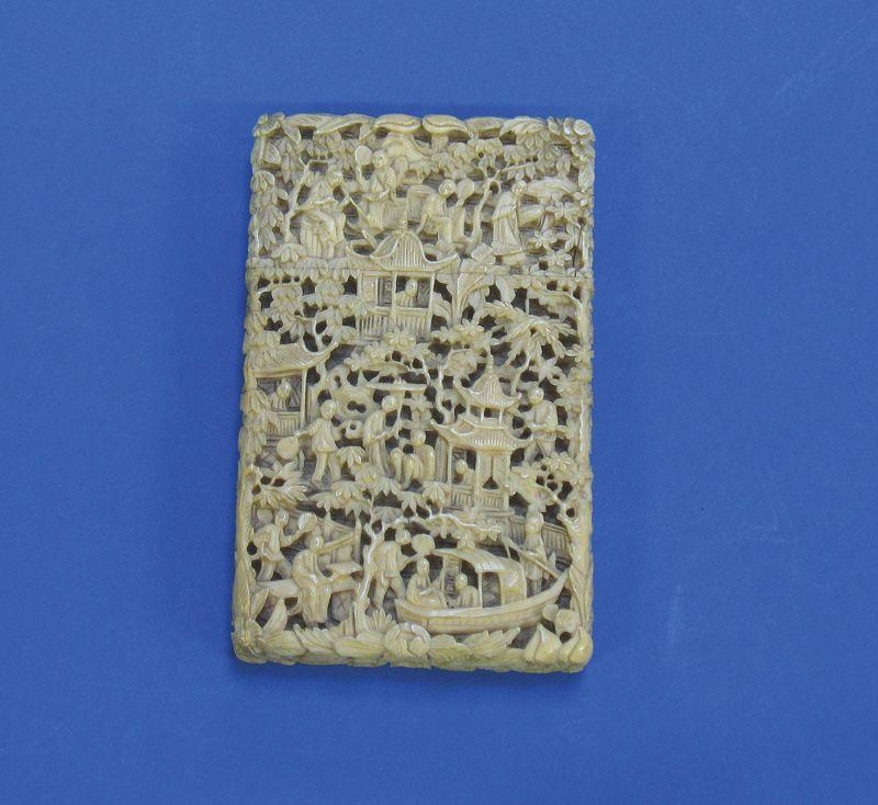 Appraisal: A CHINESE IVORY CARD CASE of rectangular form carved in