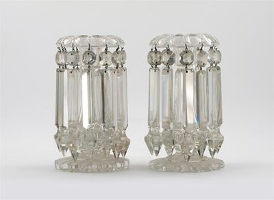 Appraisal: A pair of glass lustre table candlesticks cm in high