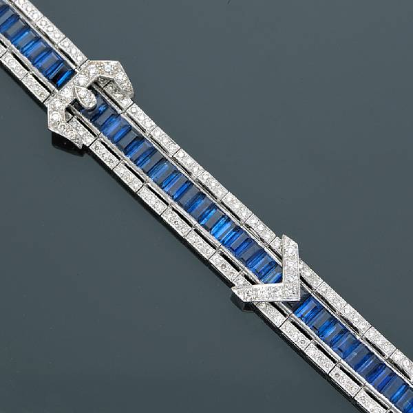 Appraisal: A sapphire and diamond buckle motif bracelet estimated total sapphire