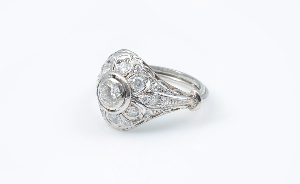 Appraisal: ART DECO PLATINUM DIAMOND RING Platinum filigree ring centering an