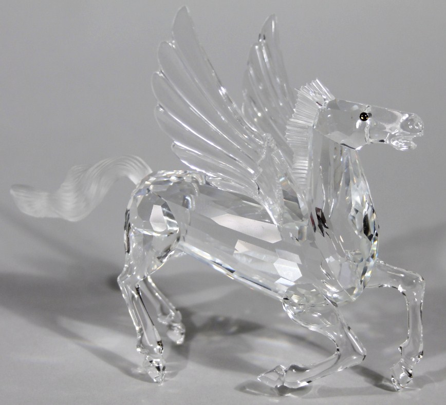 Appraisal: A Swarovski crystal figure of Pegasus with frosted glass tail