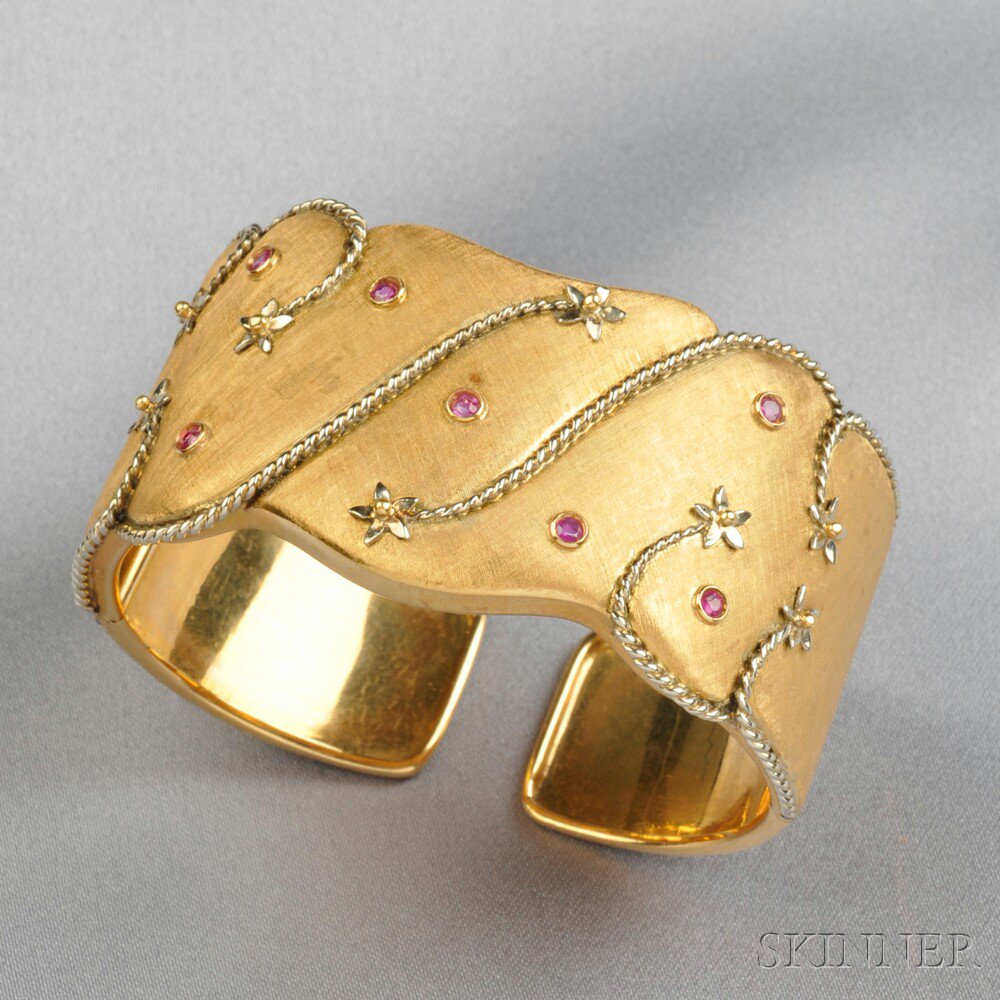 Appraisal: kt Gold and Ruby Bracelet Italy the hinged cuff set