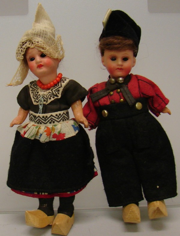 Appraisal: Pair of MINT dolls Germany painted bisque Dutch boy and