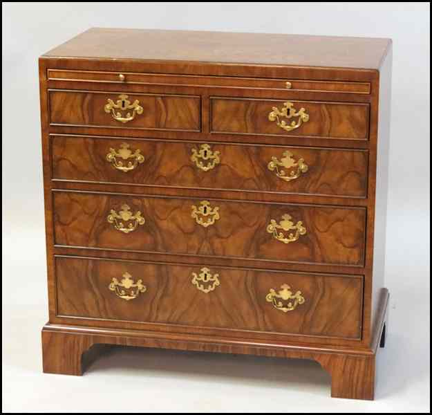 Appraisal: BAKER MAHOGANY CHEST With a pull-out embossed leather writing surface