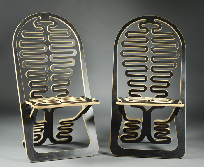 Appraisal: A PAIR OF GREGG FLEISHMAN LUMBEREST CHAIRS Sculpt Chairs Series