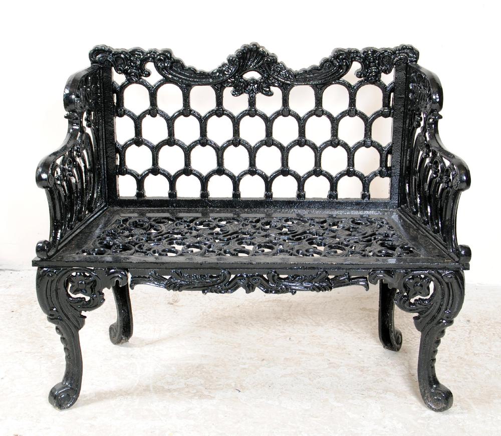 Appraisal: A SMALL CAST IRON GARDEN SEAT th century the pierced