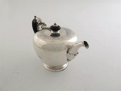 Appraisal: A George II provincial teapot of tapered globular form with