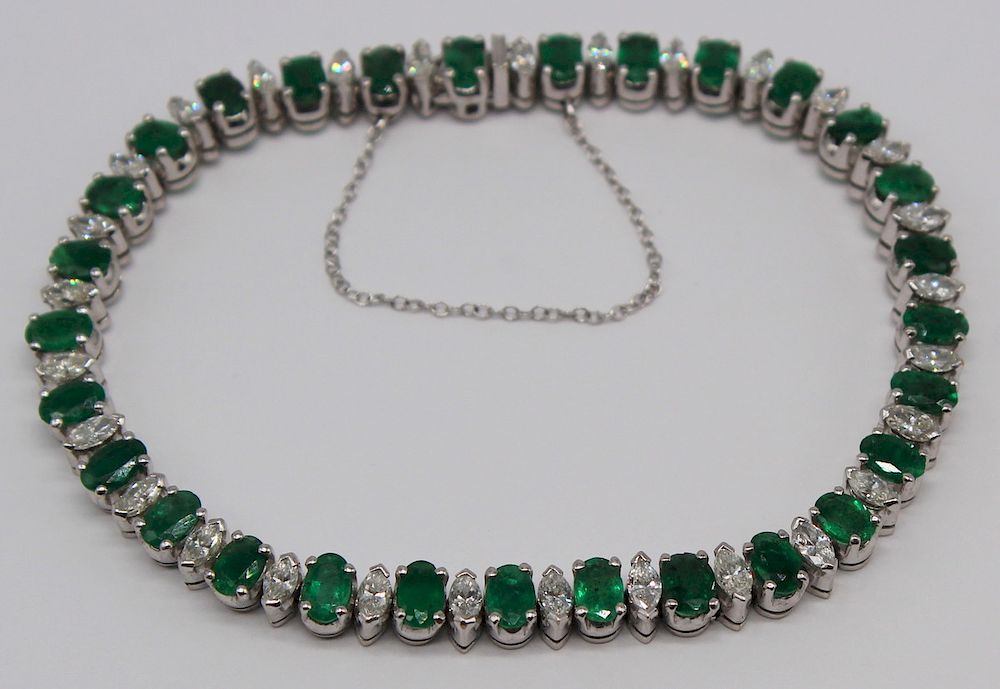 Appraisal: JEWELRY Platinum Diamond and Emerald Bracelet Platinum bracelet inlaid with