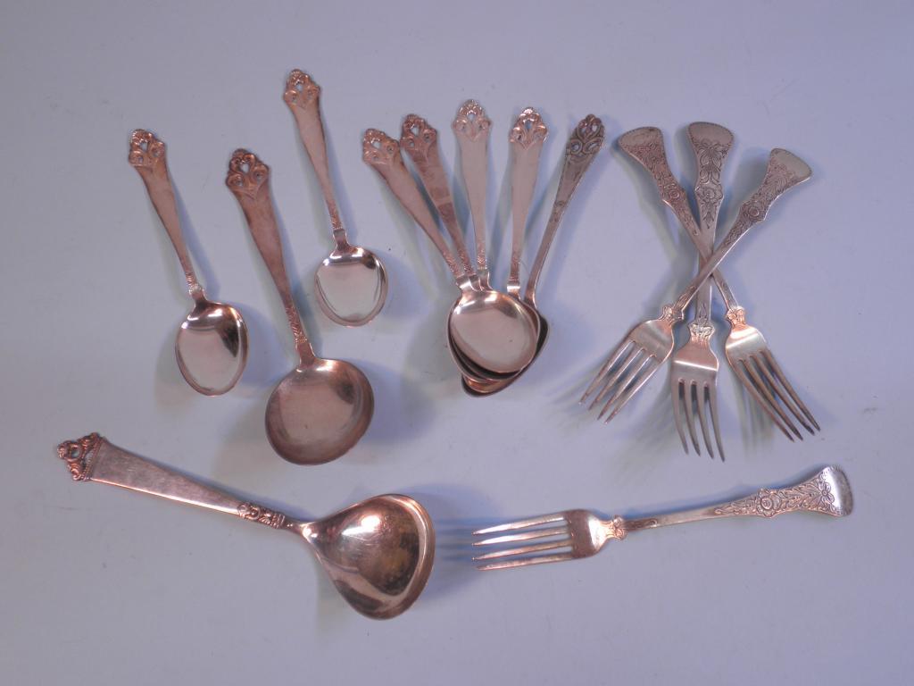 Appraisal: A quantity of decorative Norwegian white metal silver and silver