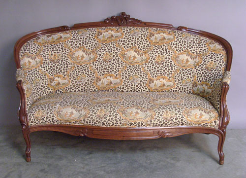 Appraisal: Victorian carved walnut sofa