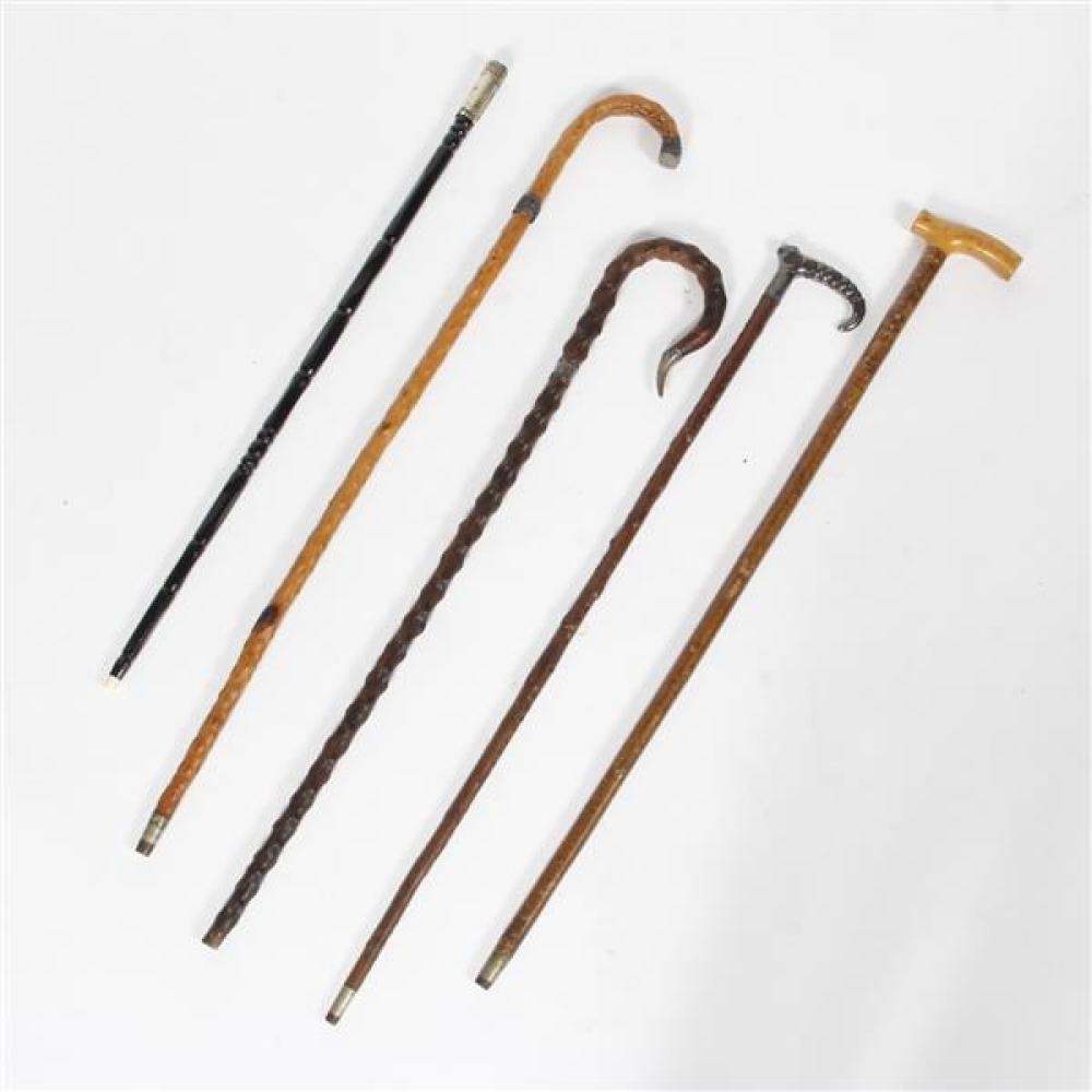 Appraisal: FIVE ANTIQUE TH CENTURY WALKING CANES WITH STERLING SILVER BONE