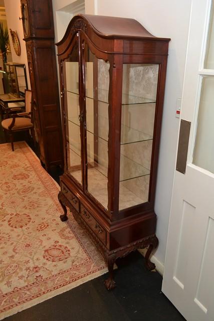 Appraisal: A CHIPPENDALE STYLE TWO DOOR CRYSTAL CABINET small crack to