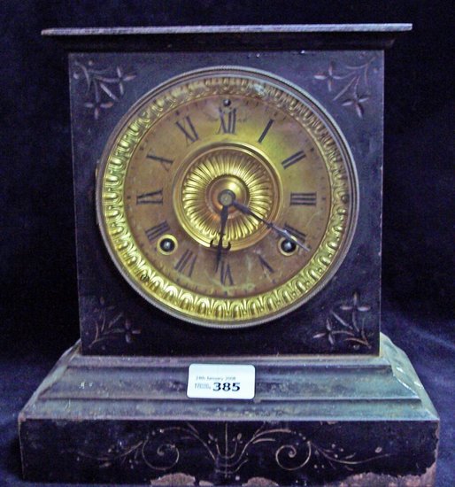 Appraisal: A Victorian black marble mantel clock with eight-day striking movement