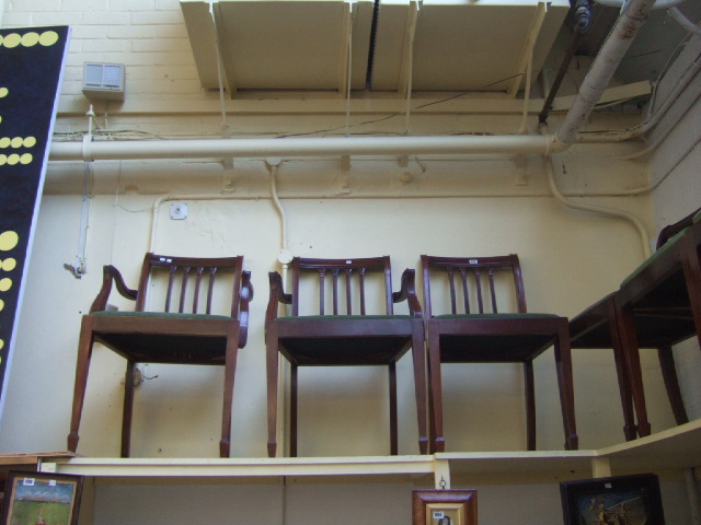 Appraisal: A set of six mahogany dining chairs with reeded splats