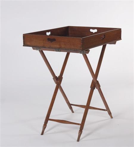 Appraisal: A th century mahogany butlers tray and stand the gallery