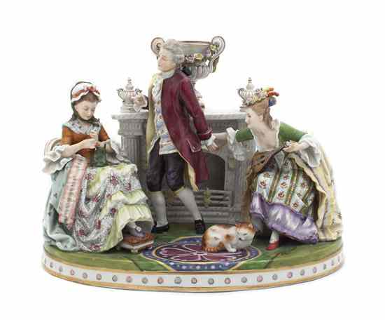 Appraisal: A Continental Porcelain Figural Group depicting a gentleman and two