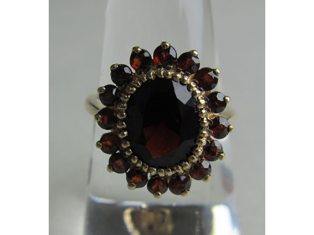 Appraisal: Nine carat gold garnet cluster ring