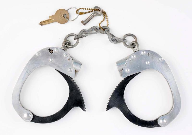 Appraisal: Rivoilier Handcuffs High security Replacement keys Size ' L