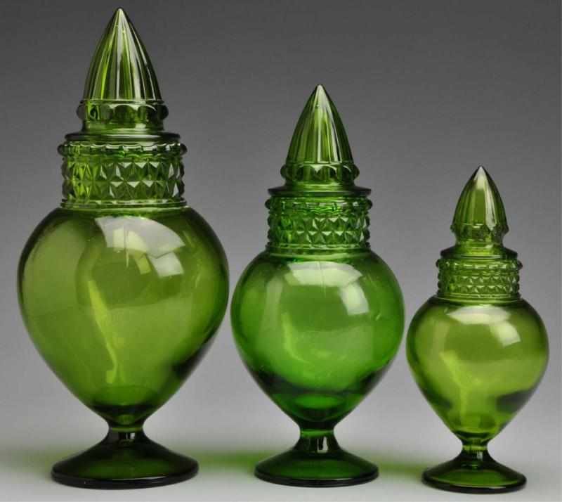 Appraisal: Lot of Heck Spired Urn Green Apothecary Jars Description Set