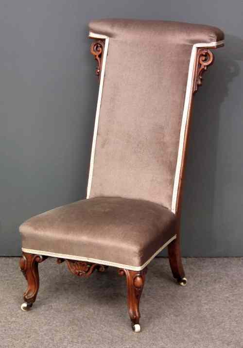 Appraisal: A late Victorian walnut Prie Dieu chair with shaped and