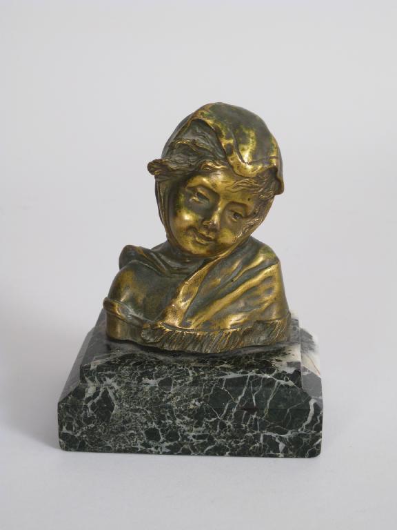 Appraisal: CH MONGINS a small bronzed Female Bust wearing flowing head