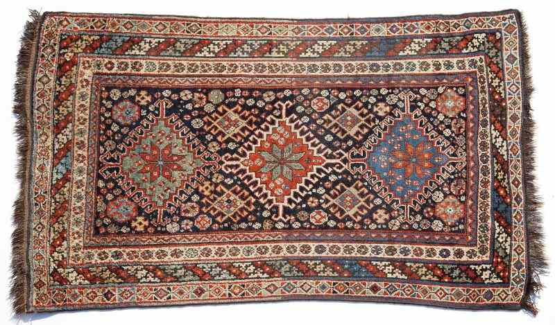 Appraisal: Semi-Antique Kurdish Rugwool foundation with three central diamond medallions on