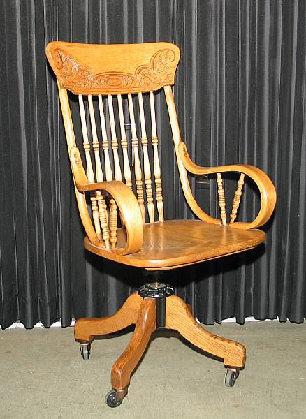 Appraisal: An American oak pressback office chair early th century height