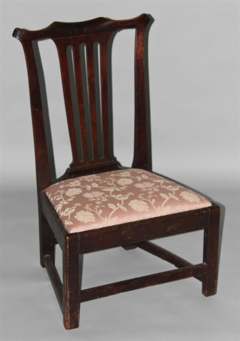 Appraisal: DIMINUTIVE CHIPPENDALE MAHOGANY SIDE CHAIR shaped crest with ears pierced