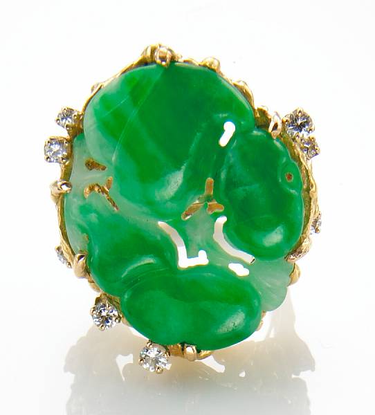 Appraisal: A carved jadeite jade diamond and k gold ring jade