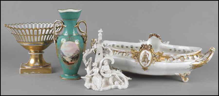 Appraisal: RETICULATED GILT PORCELAIN BASKET Together with a porcelain figural group