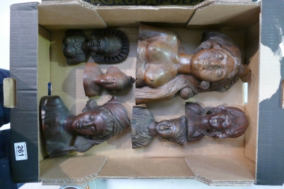 Appraisal: A collection of th Century oriental carved figure heads