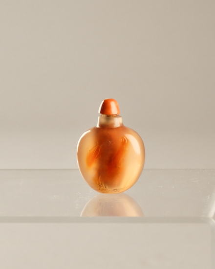 Appraisal: A th C Agate Snuff Bottle having carved design of