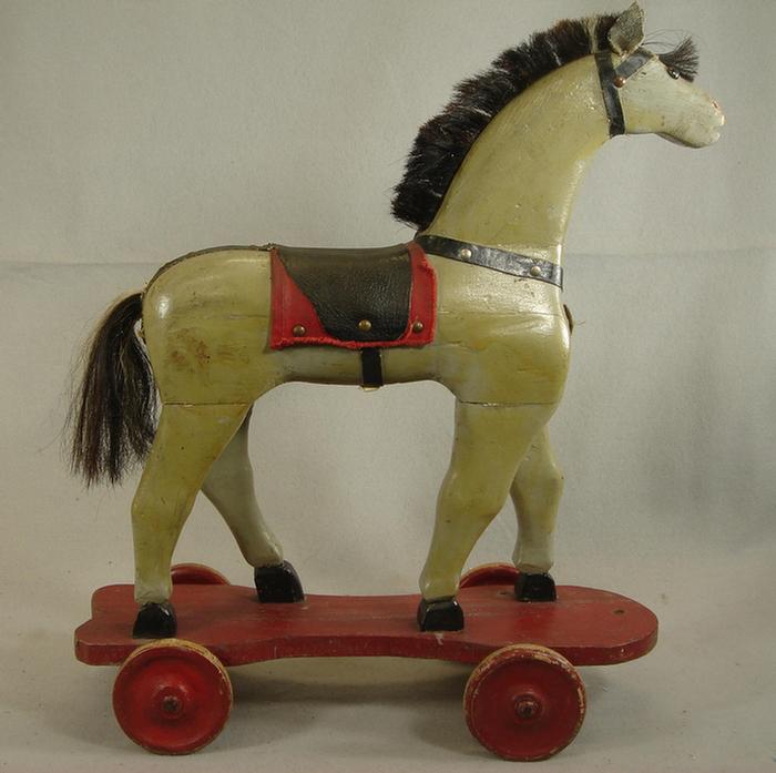 Appraisal: Carved painted wood horse pull toy horse hair mane tail