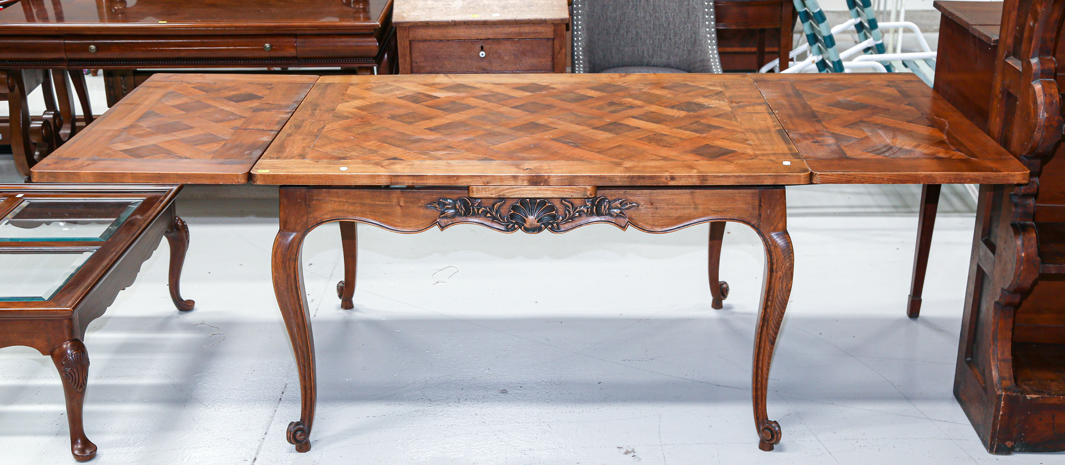 Appraisal: FRENCH PROVINCIAL DRAW LEAF DINING TABLE th century cherry with