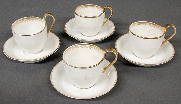 Appraisal: - Four KPM porcelain cups and saucers with gilt decoration