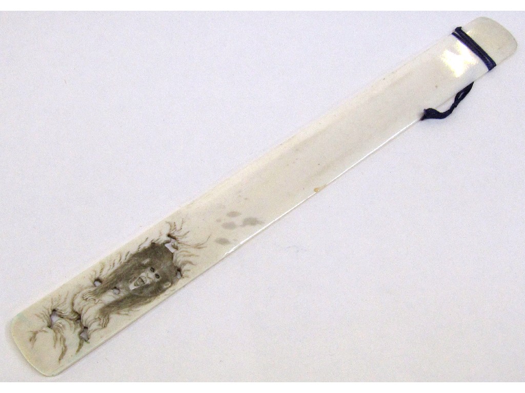 Appraisal: Ivory letter opener with depiction of a monkey emerging from