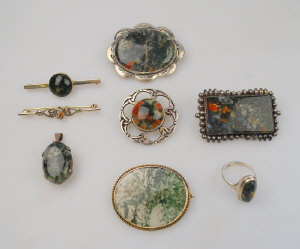 Appraisal: Collection of six moss agate brooches to w moss agate